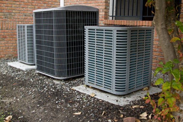 istock Condominium air conditioners in a row 2173982981