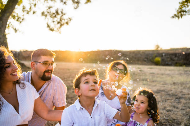 istock Family play with bubbles 2173985665