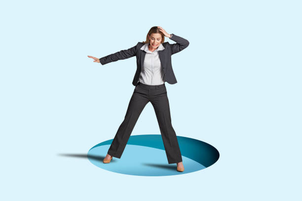 istock Woman Standing On Trap Door 2173988232