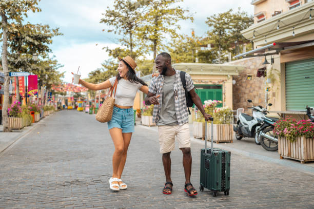 istock Joyful Diverse Couple Explores Urban Destination 2173988684