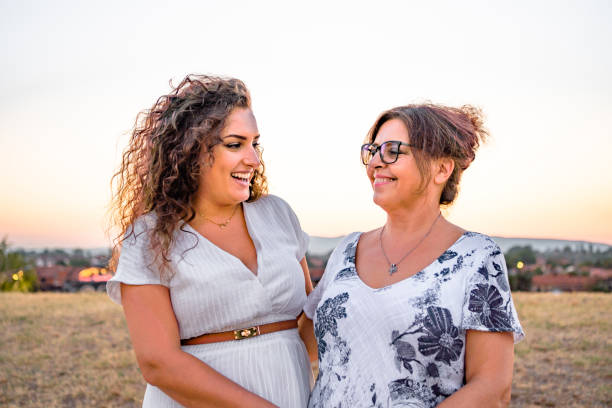 istock Two woman hug each other 2173989185