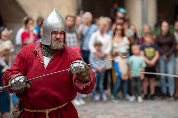 Vouzela / Portugal - 07 07 2019 : Street theater view with knights simulating typical environment in medieval market