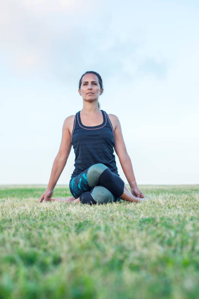 istock A Young woman doing yoga exercise outdoor 2173999151