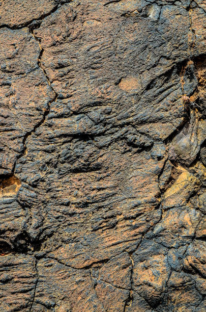 istock The image is of a rock with a rough, jagged surface 2174001457