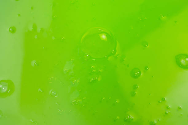 Green slime toy as a background. Top view.