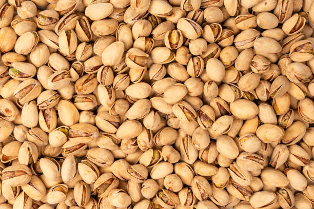 istock Tasty pistachios isolated on a white background. 2174002464