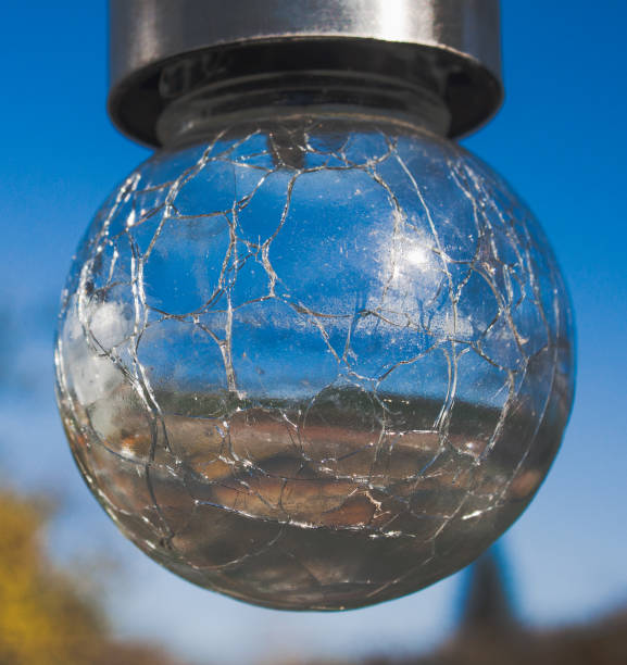 istock A small round garden lantern closeup with a sky in the background 2174002988