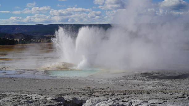 istock Bursting Geothermal Spring in Yellowstone National Park 2174004453