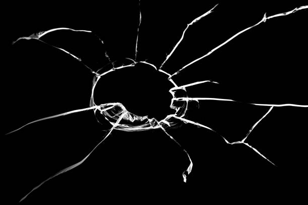 istock bullet hole on glass black background for overlay, transparent window 2174006123