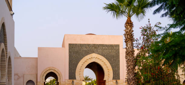 istock Agadir, Morocco : the bazaar called Souk El Had. Islamic architecture : door. Palm trees. 2174007615