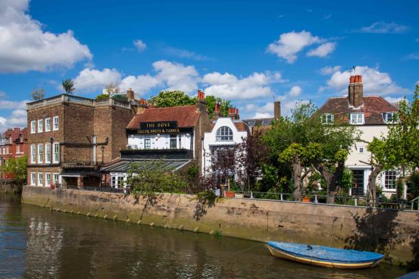 Lechlade, United Kingdom - August, 2019: The Riverside Inn on the River Thames at Lechlade, Gloucestershire, United Kingdom