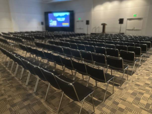 istock A large auditorium with several rows of chairs 2174018782