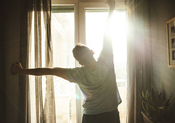 istock Man Looking Out of Window 2174022217