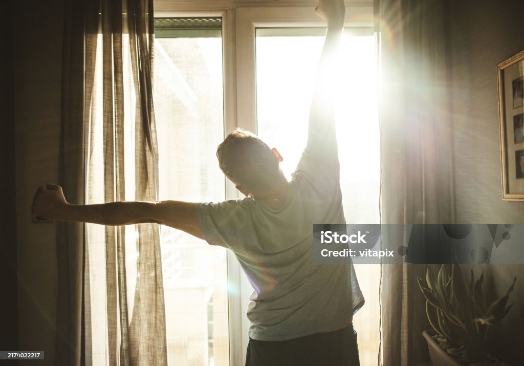 Men Look Out Window Man Looking Out Of Window Stock Photo - Download Image Now - Curtain ...