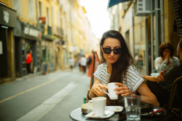 istock woman enjoys her coffee break in Aix en Provence 2174022334