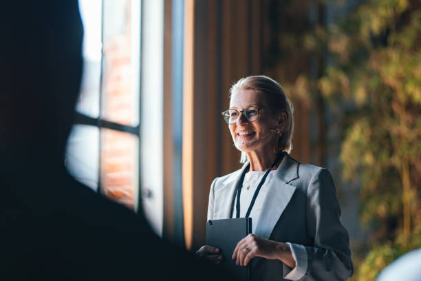 istock Professional Speaker Delivering Presentation at Business Event 2174029621