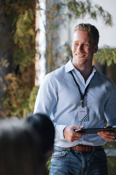 istock Professional Speaker at Business Event Giving Engaging Presentation 2174029627