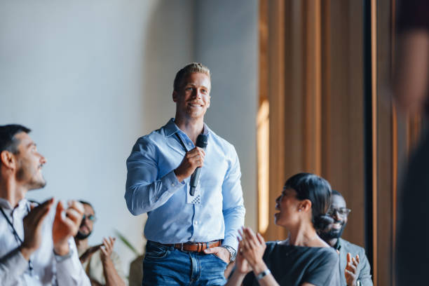 istock Businessman Engages Audience During Professional Event Speech 2174029632