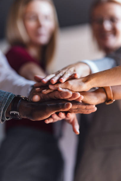 istock Diverse Business Team Joining Hands in Unity and Support 2174029664