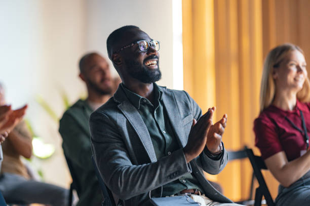 istock Business Professionals Enjoying a Motivational Speech at Event 2174029777