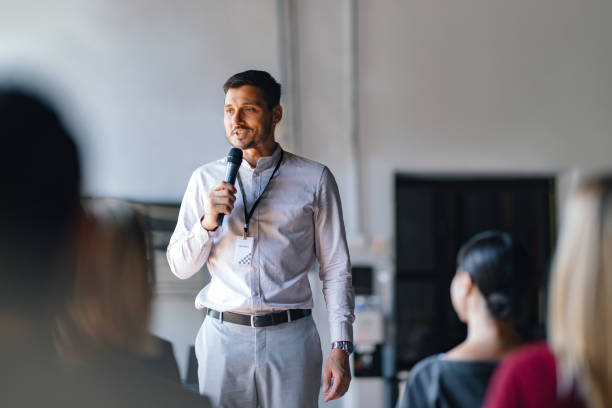istock Business Professional Giving Speech at Networking Event 2174029831