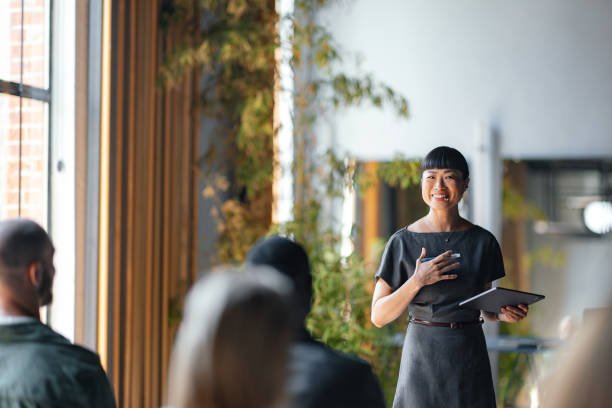 istock Confident Businesswoman Speaking at a Professional Event 2174029837