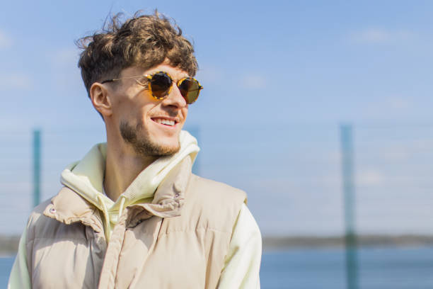 istock Young man in warm clothes outdoors 2174030272