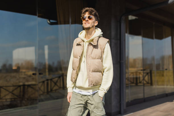 istock Young man in warm clothes outdoors 2174030317