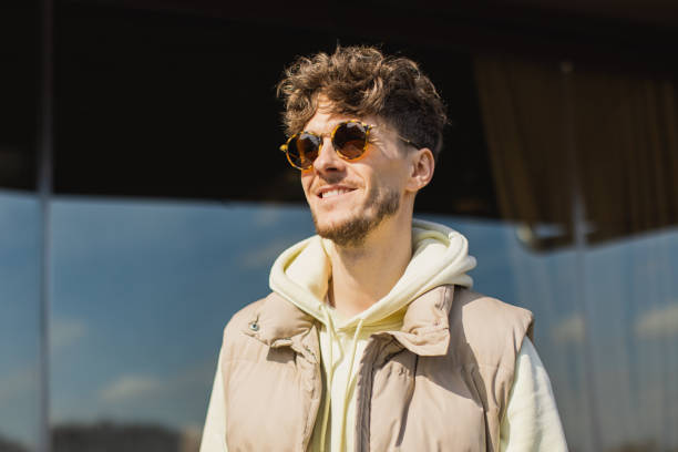 Young man in warm clothes outdoors
