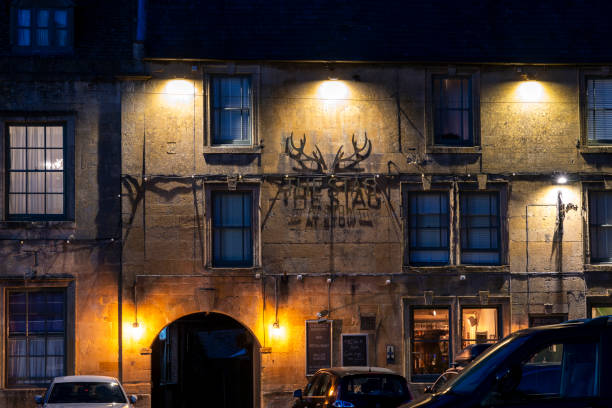 Stow on Wold United Kingdom - July 26 2024; Street scene with The Stag at Stow pub in The Cotswolds, UK