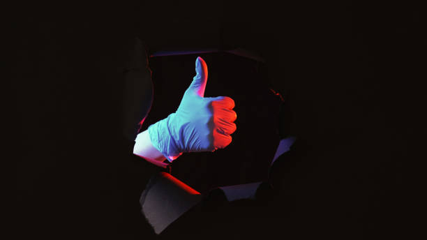 istock Doctor like experiment success hand glove thumb up 2174040127