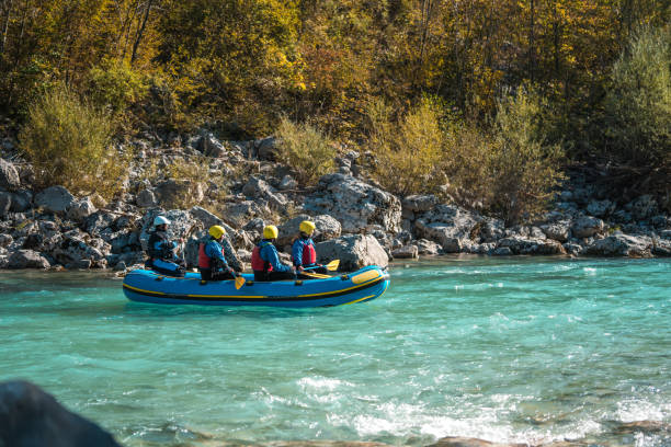 istock Mature Adults on Diverse Guided Rafting Expedition 2174042954