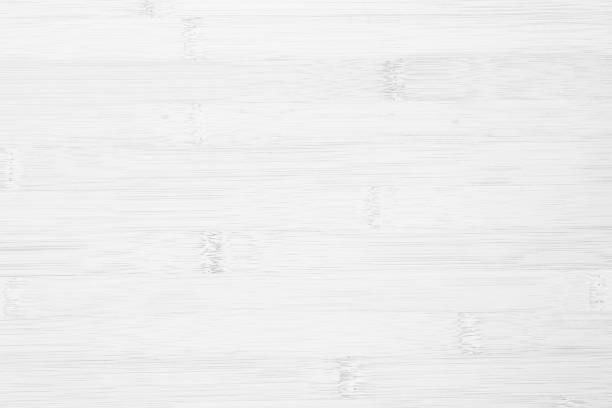 istock White wooden desk texture background, Top view. Abstract top bar table wood bamboo pattern nature. Design wall vintage interior kitchen. Bamboo skin cutting board empty for displaying products. 2174045702