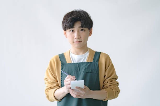istock Young shopYoung shop staff 2174073771
