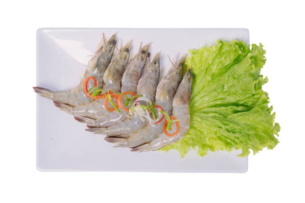 large frozen king prawns on shelves in a store