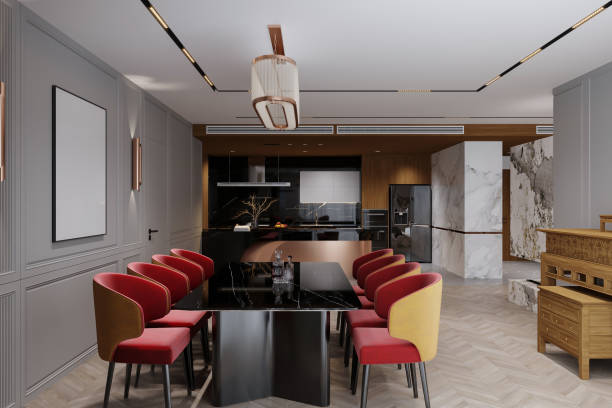 istock Modern Dining Room with Red Velvet Chairs, Black Marble Table, and Open Concept Kitchen 2174078602