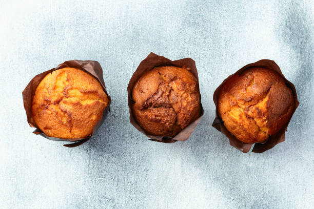 istock Sweet Baked vanilla muffins ( cupcake )  . Top view 2174083092