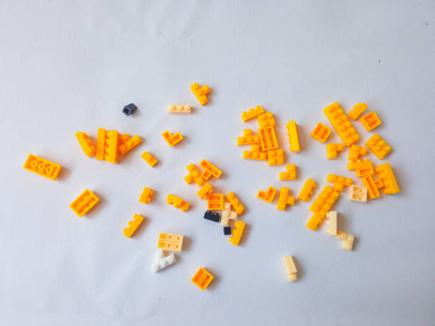 Colorful Plastic Yellow Toy Bricks Background