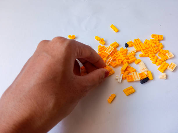 Colorful Plastic Yellow Toy Bricks Background