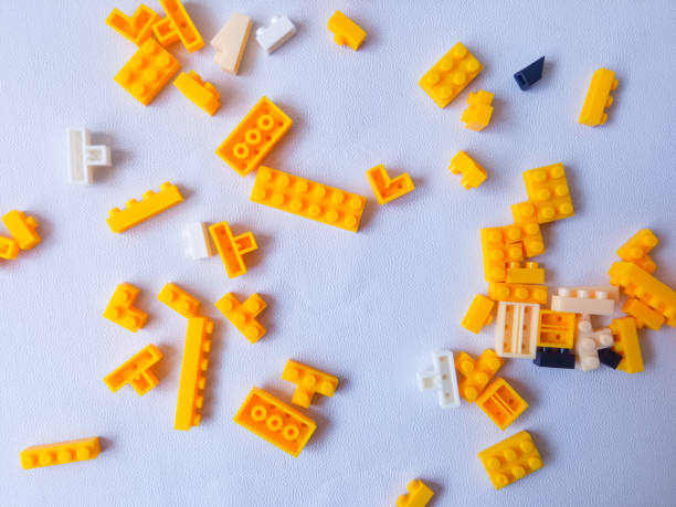 Colorful Plastic Yellow Toy Bricks Background
