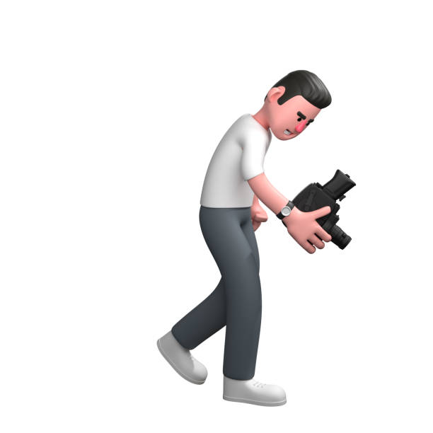 istock 3D Media Practitioner. A male photographer is walking with his right hand holding a camera pointed downwards. Male Photographer 2174086121