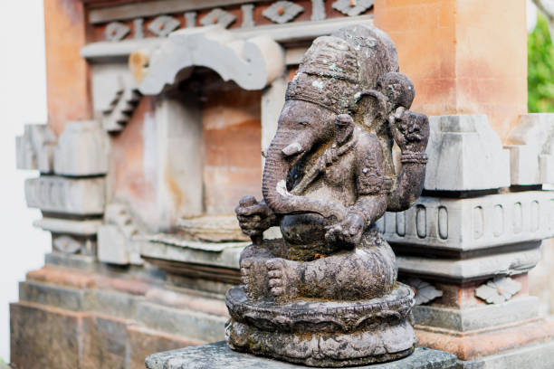 Stone statue of a Balinese deity. Shot taken in Ubud
