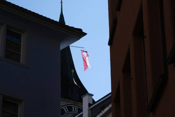 Contextual integrity: Berlin, Germany, January 04, 2024, Swiss Flag on Roof of Swiss Embassy in Berlin.
