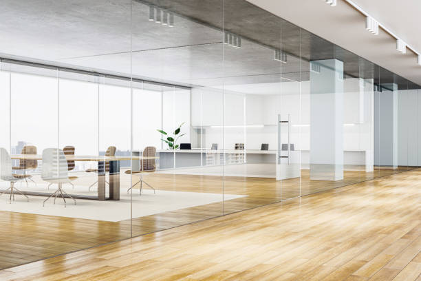 istock Modern empty office interior with glass partitions and wooden flooring. 3D Rendering 2174090548