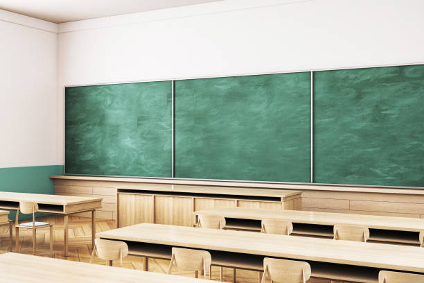 istock Empty classroom interior with wooden furniture and green chalkboard. 3D Rendering 2174090562