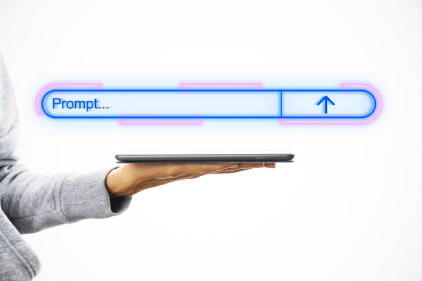 istock Hand holding a tablet with a search bar floating above it on a white background. 2174090736