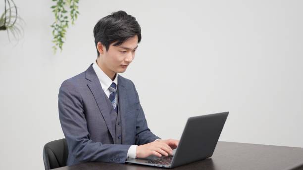 istock Businessman typing on a laptop 2174091194