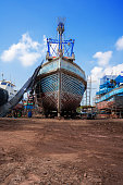 fishing-boat-waiting-for-maintenance-to-be-repaired-and-painted-at-repair-yard-for-boats.jpg?b=1&s=170x170&k=20&c=t98T8pwj_7Iq7FAt_J-ZlQXb6gBqDCMT-qwIEShzAnw=
