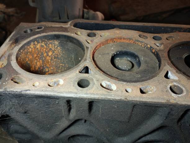 istock Disassembled old engine cylinder block with obvious damage and rust in the cylinder bores. The topic of cars and engine repair. 2174093133