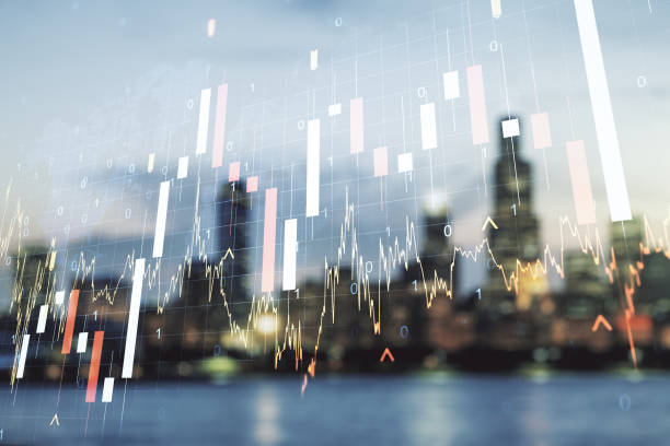 Abstract creative financial graph and world map on blurry skyscrapers background, financial and trading concept. Multiexposure
